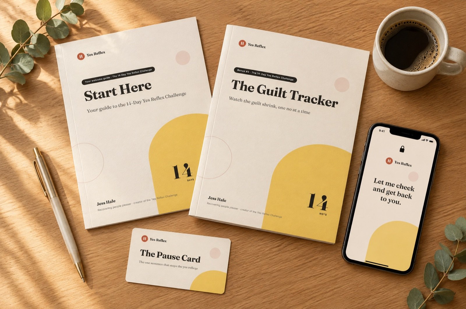 The Start Here guide, the Guilt Tracker, a Pause Card and a phone with the Pause Card lock screen on a kitchen table